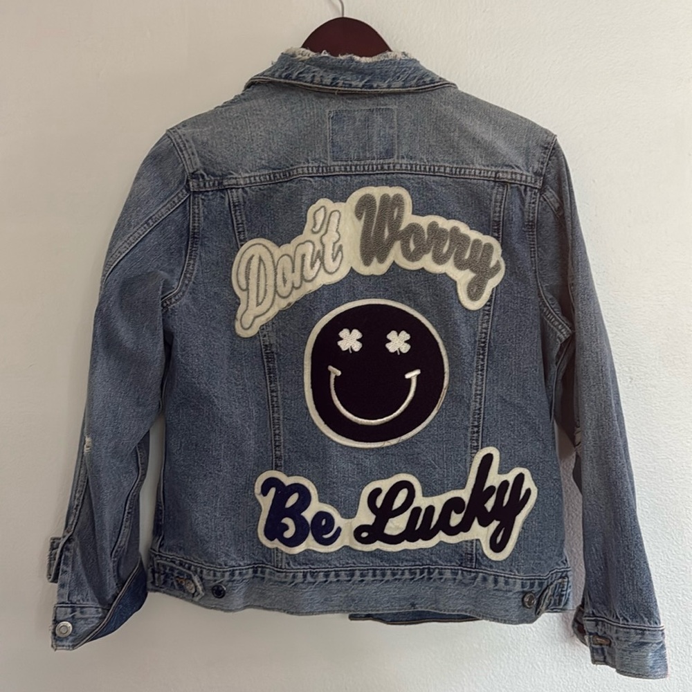 Lucky brand denim jacket with backpack patch